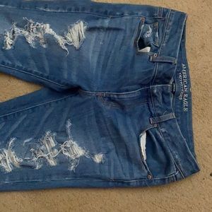 Bell bottom ripped jeans